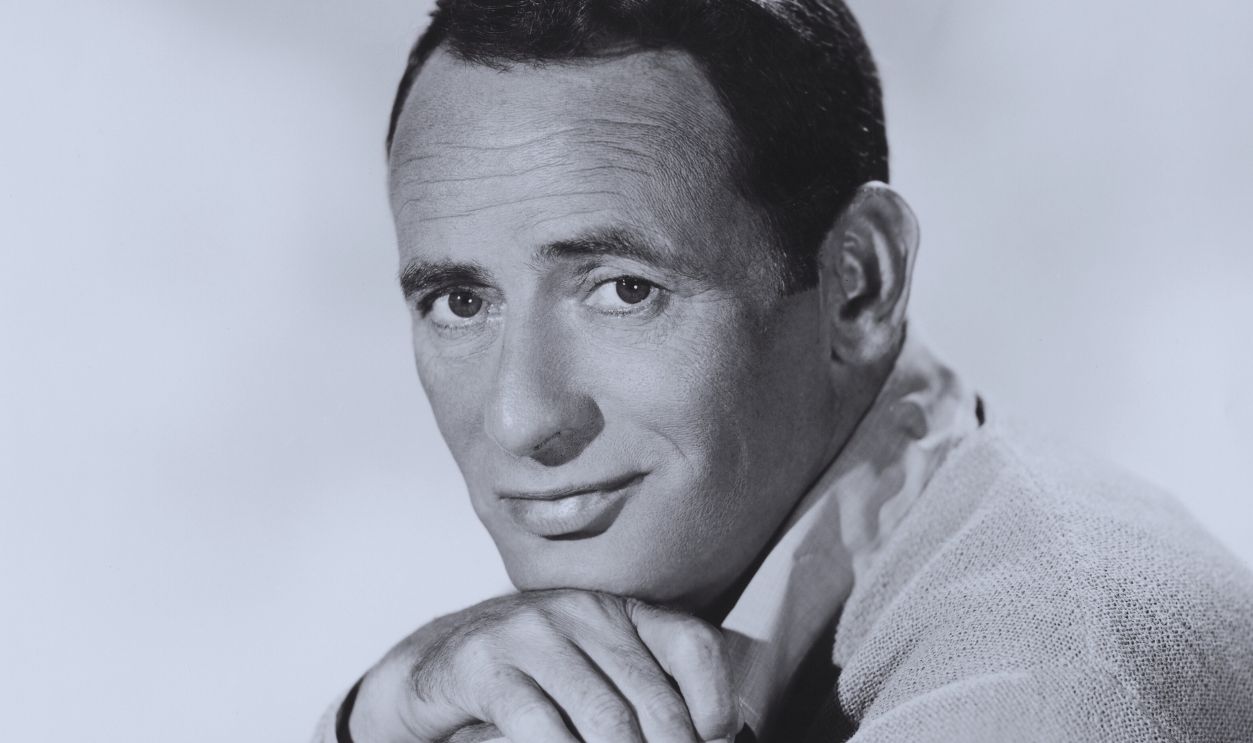 Gettyimages - 526810758, Actor Joey Bishop Leaning on Fence Informal head and shoulders portrait of entertainer Joey Bishop. 