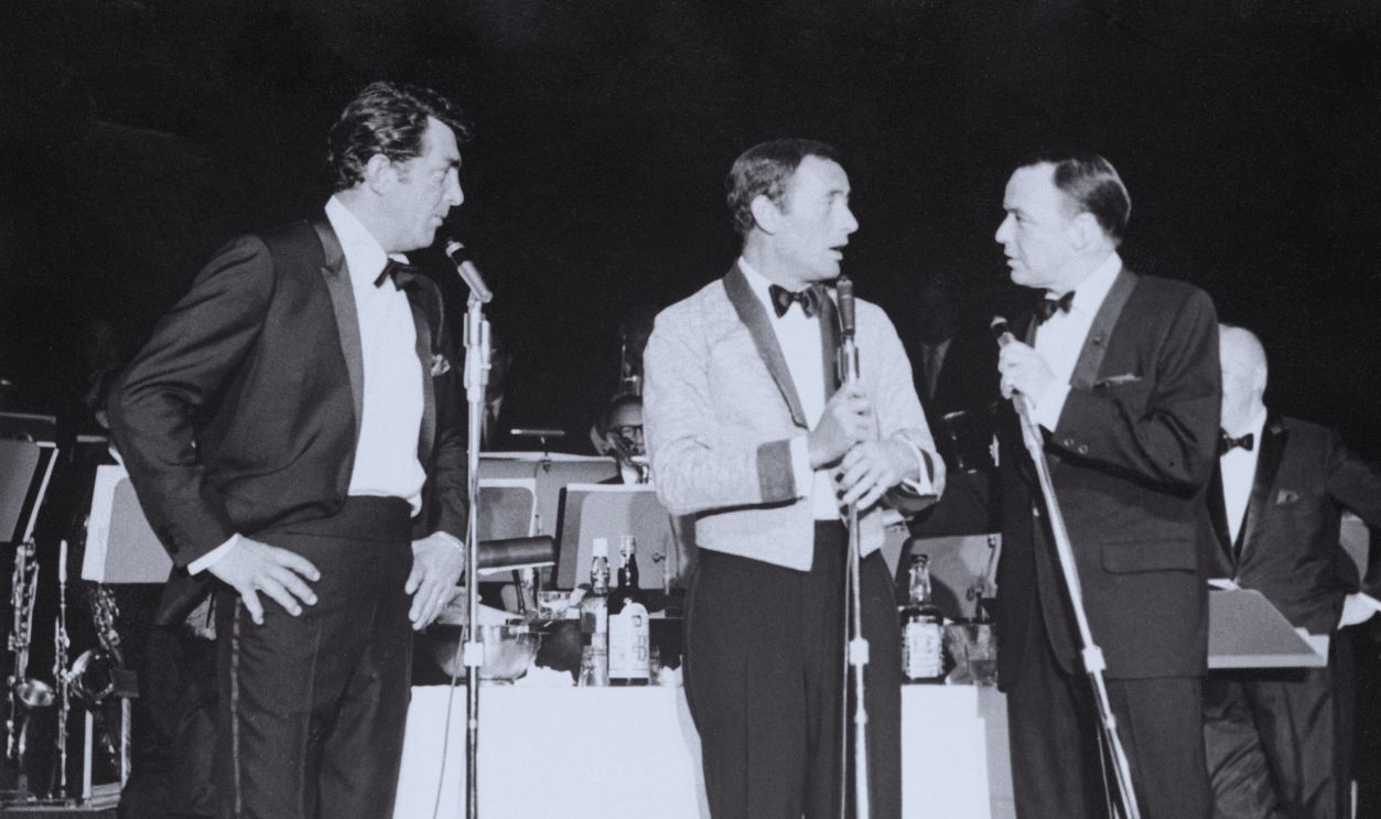 Gettyimages - 515533196, Dean Martin, Joey Bishop, and Sinatra (Original Caption) Las Vegas, Nevada: Dean Martin and his friends, Frank Sinatra and Joey Bishop, opened a three-week engagement at the Sands Hotel in Las Vegas, April 13, determined that their songs, patter and assorted hijinks qualify them as 