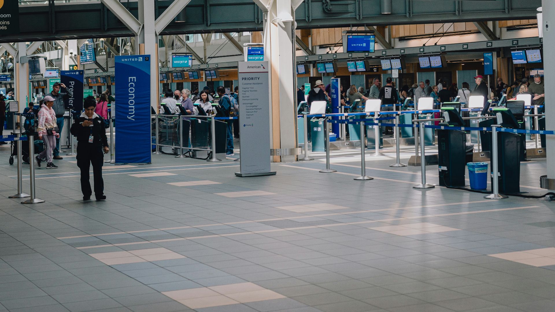 a group of people standing around a terminal