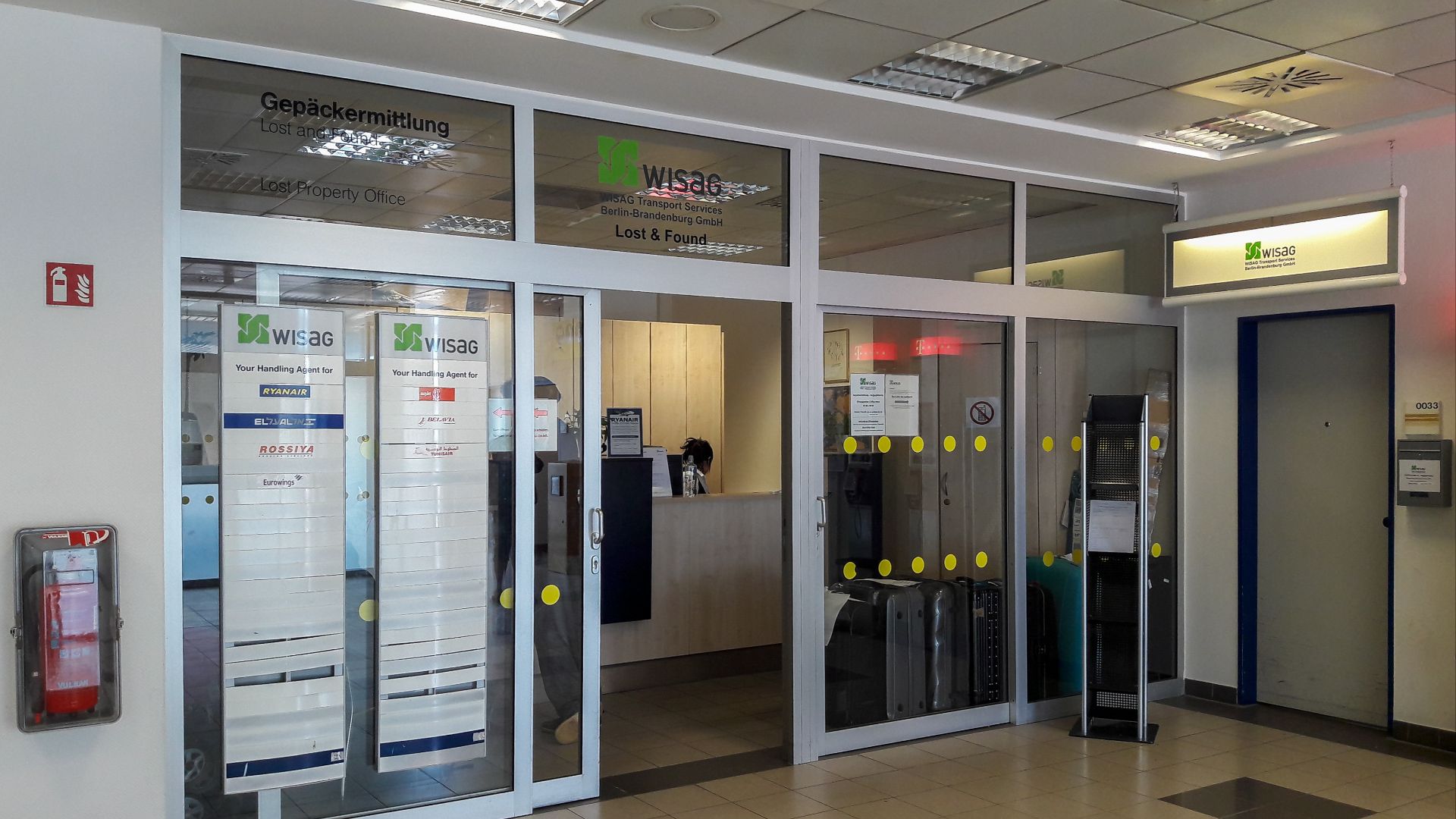 File:WISAG baggage office, Schonefeld Airport.jpg