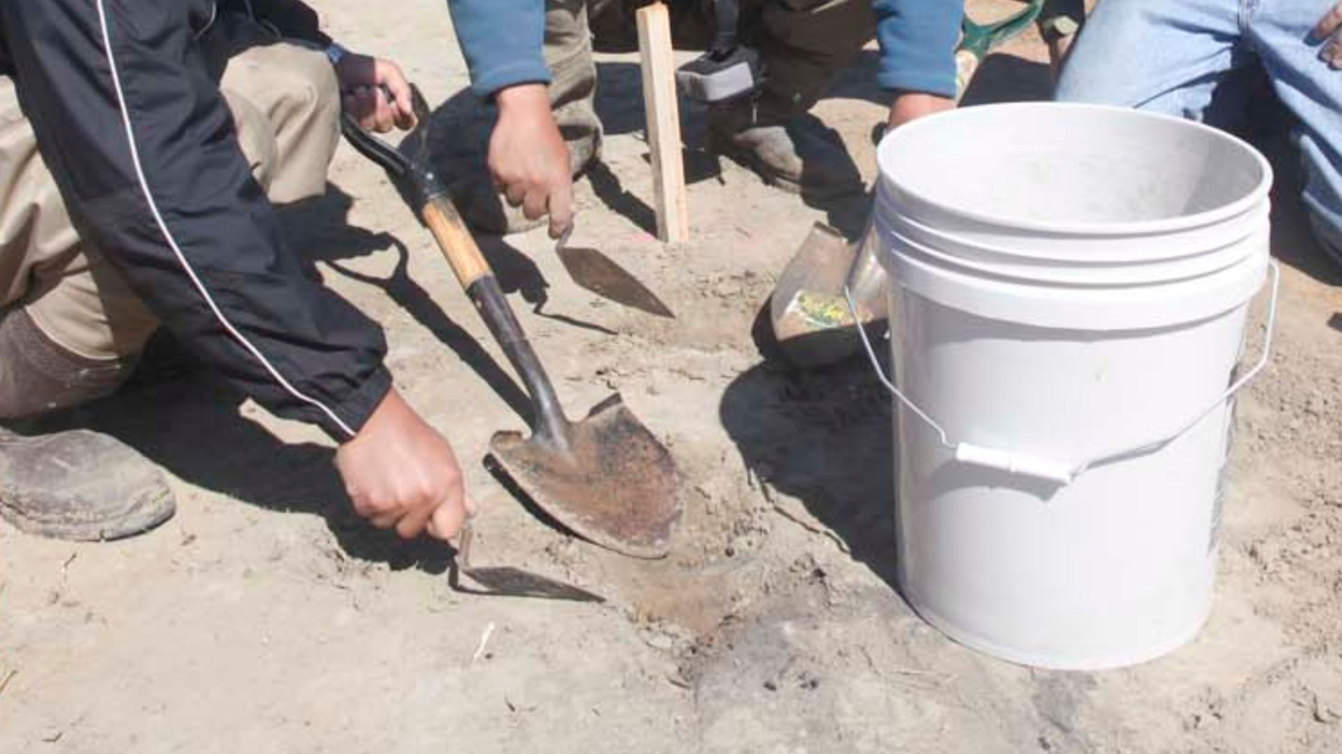 File:Digging an archaeological test pit (6056083731).jpg