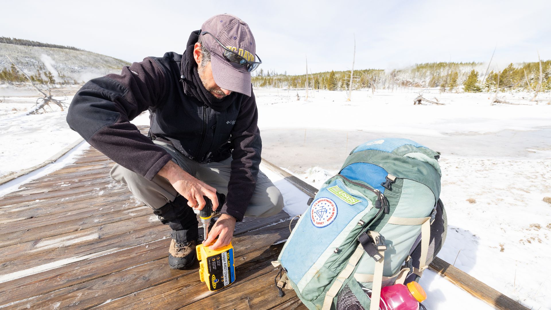 File:Mike Poland, USGS Scientist-in-Charge, replacing batteriest in a data logger (2) (52081690912).jpg