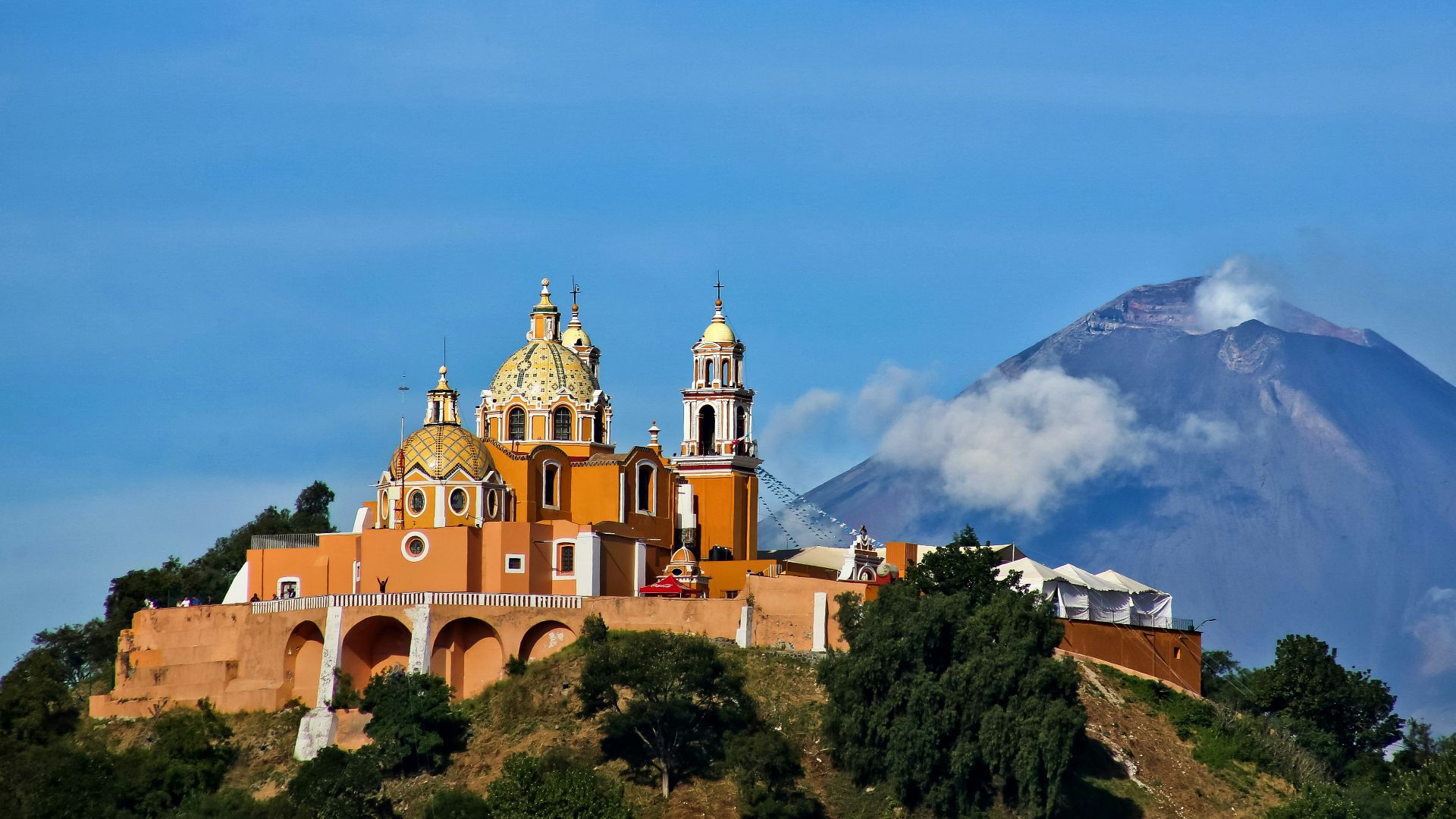 a large building on a hill