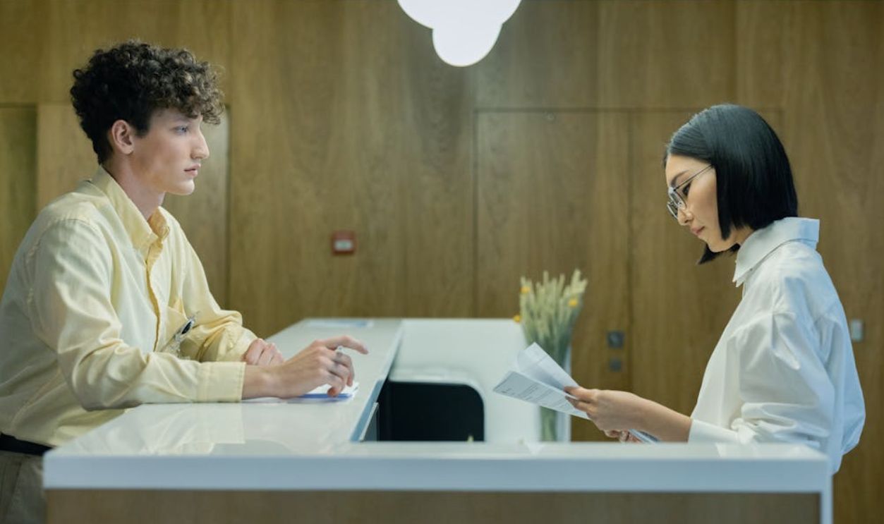 A Man Standing at the Reception