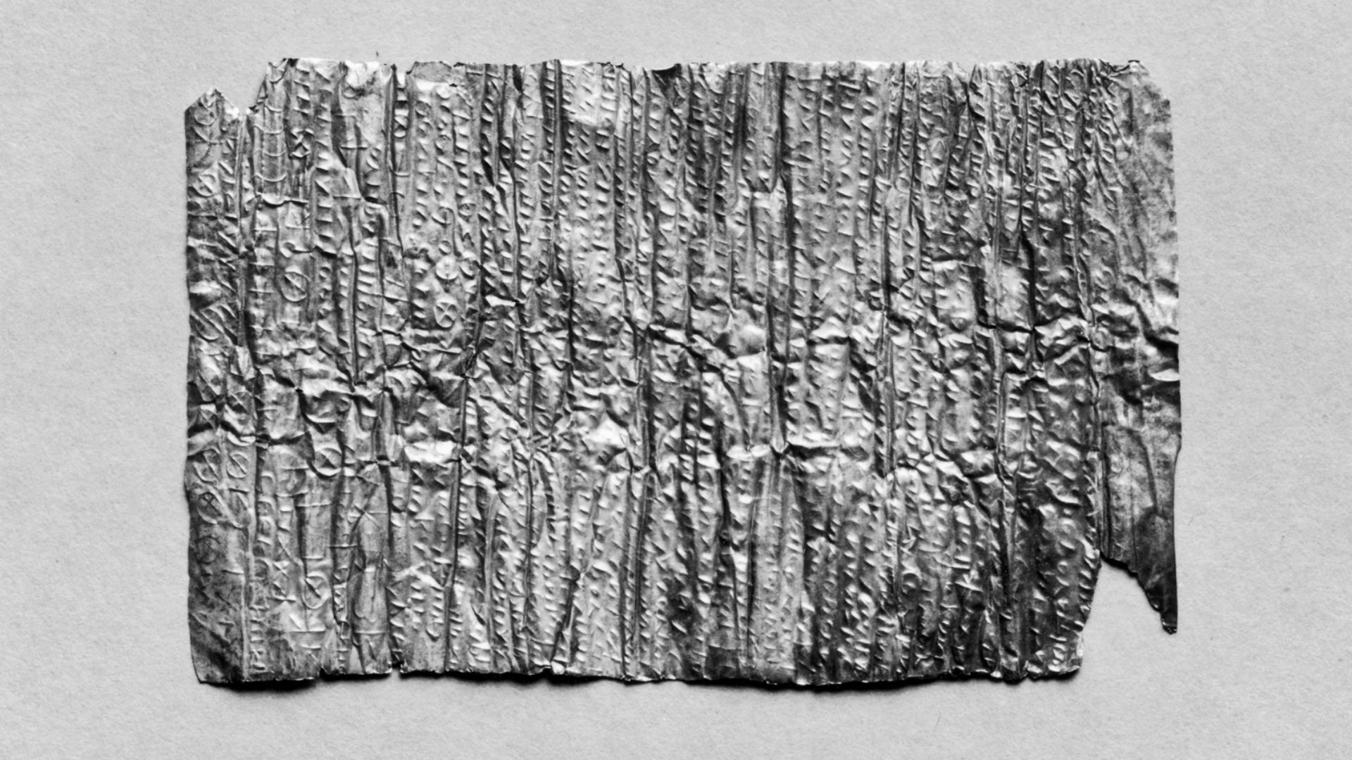 This thin sheet of gold (lamella) is inscribed with Greek letters and magical symbols. The text, written by a professional scribe for a man named Proclus, contains a spell to ensure his victory in a trial before the military governor of the Roman province of Arabia. It ends with a curse on his opponents, whom he wishes silenced, subjugated, and enslaved. Tightly rolled, the inscription was originally held inside a small capsule and worn around the neck as an amulet.