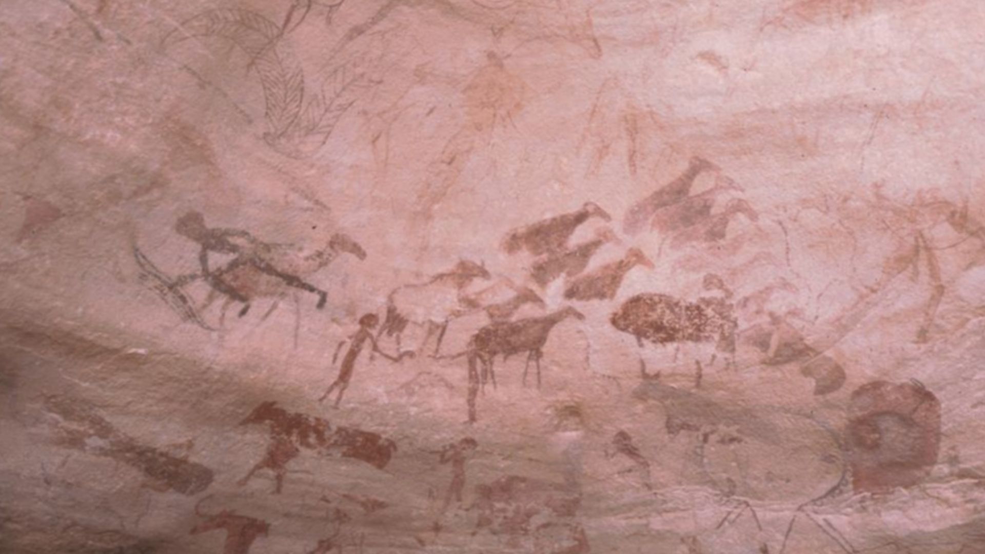 Herd of rams and anthropomorphic figures.