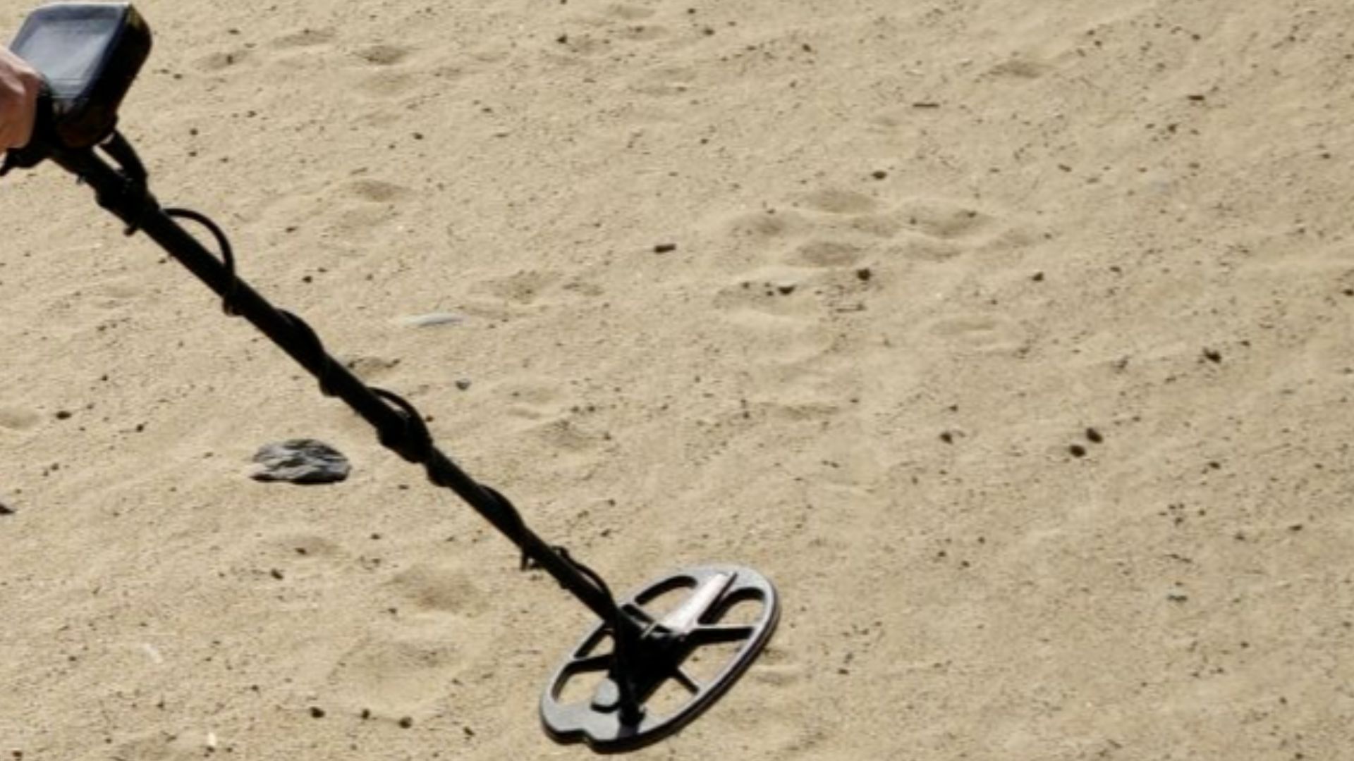 Metal detector on the beach
