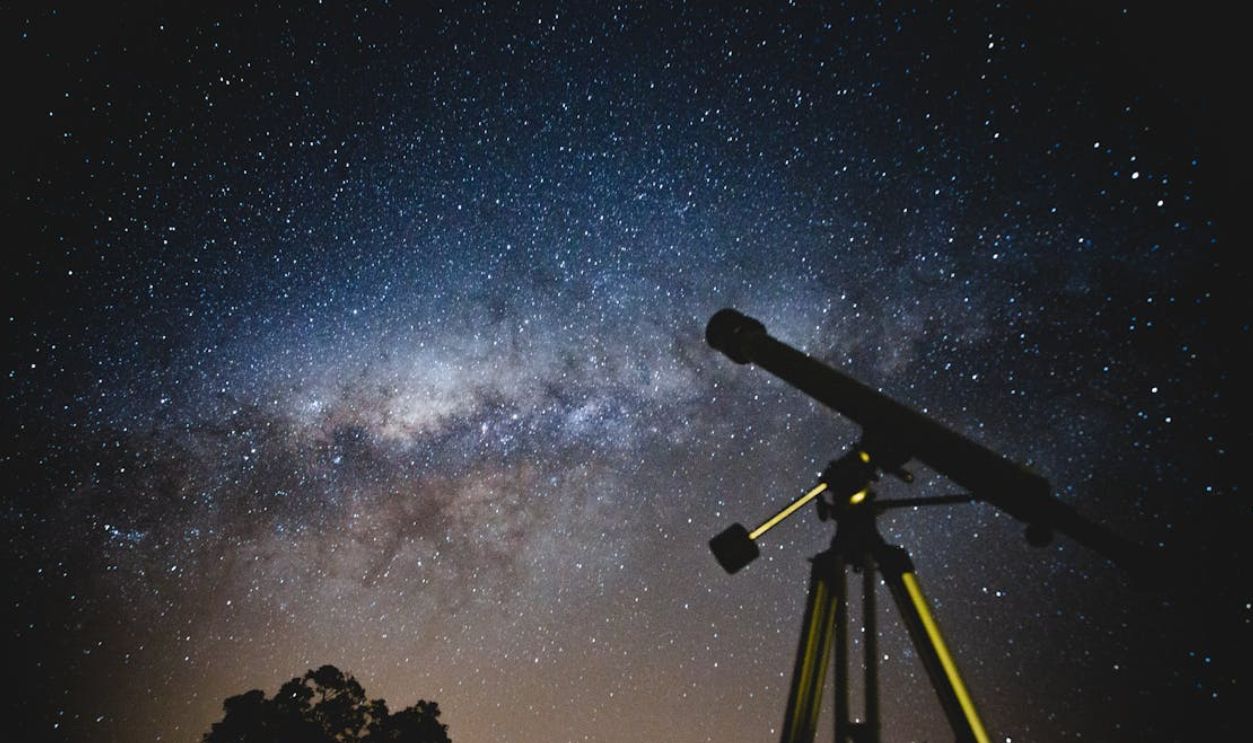 Black Telescope Under Blue and Blacksky