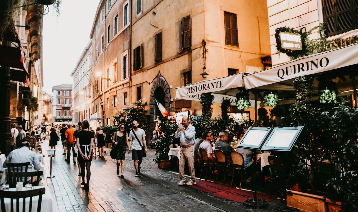 Bustling Evening Street in Rome, Italy