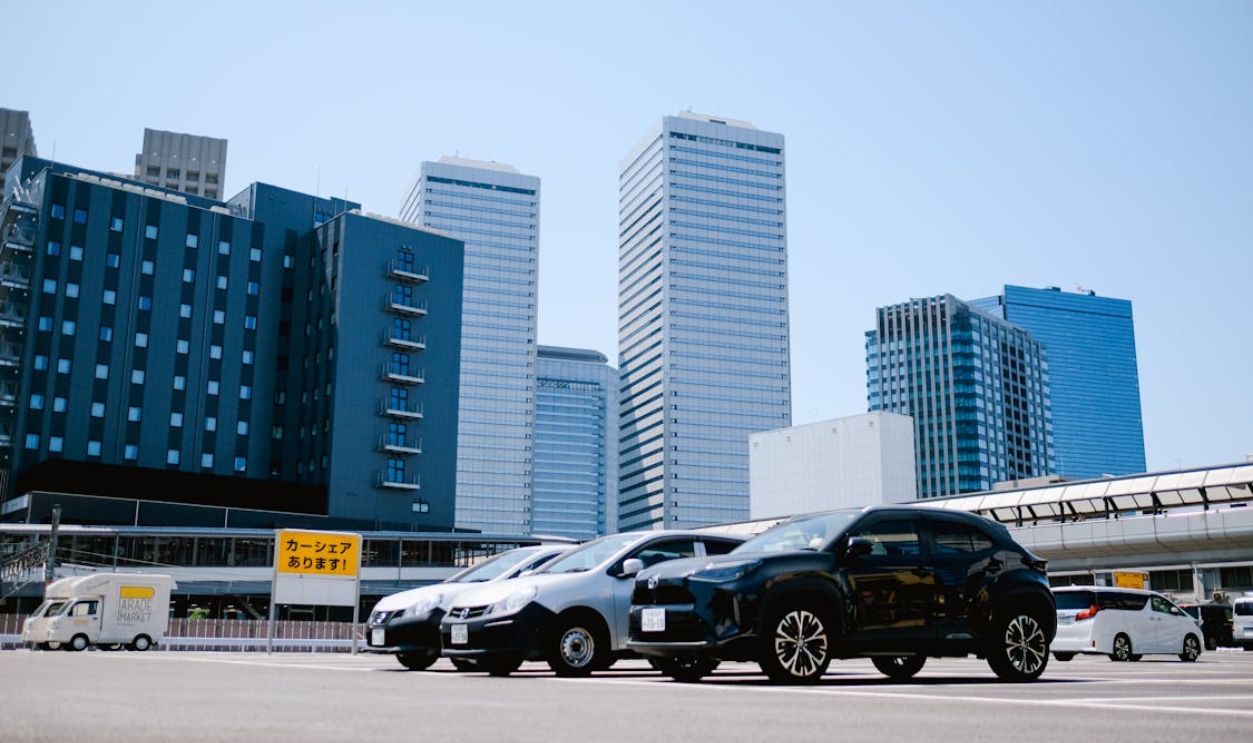 Modern Cityscape with Parked Cars in Urban Area