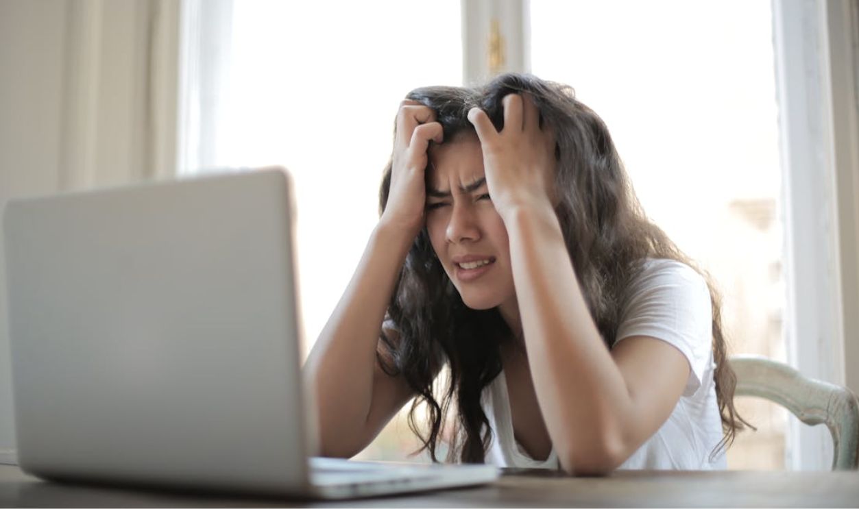Woman in White Shirt Showing Frustration