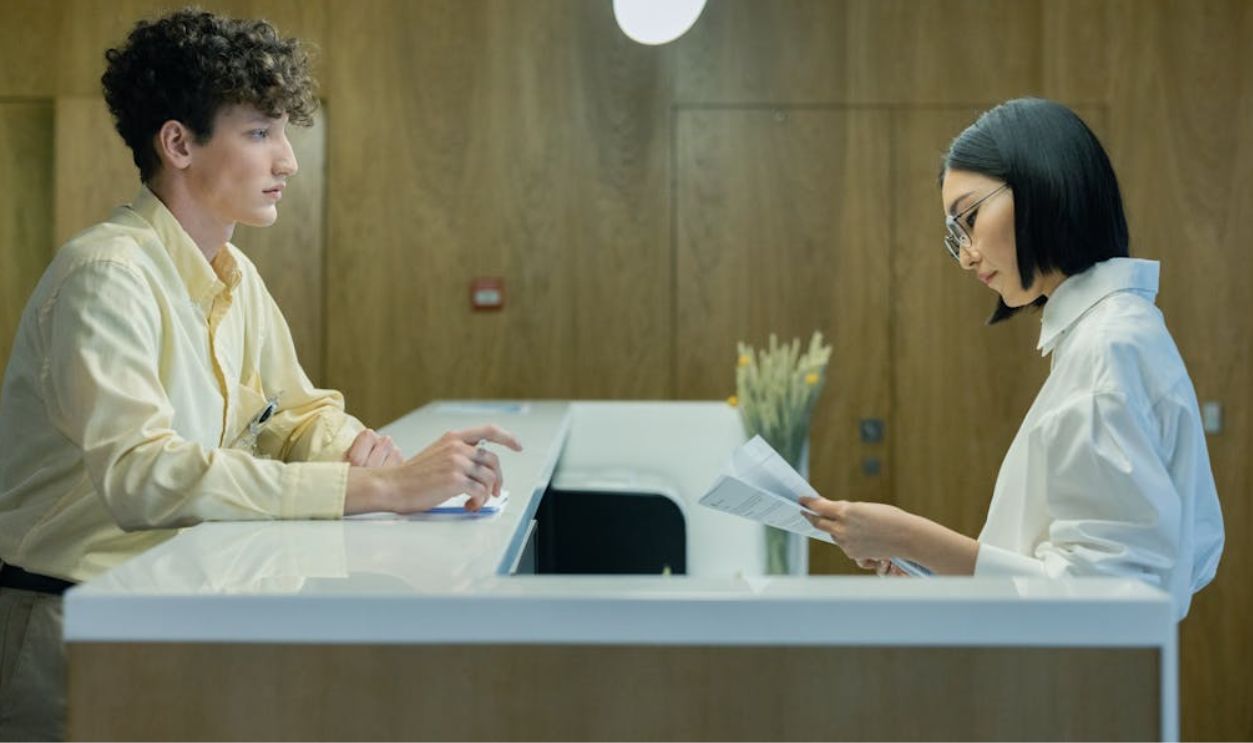 A Man Standing at the Reception
