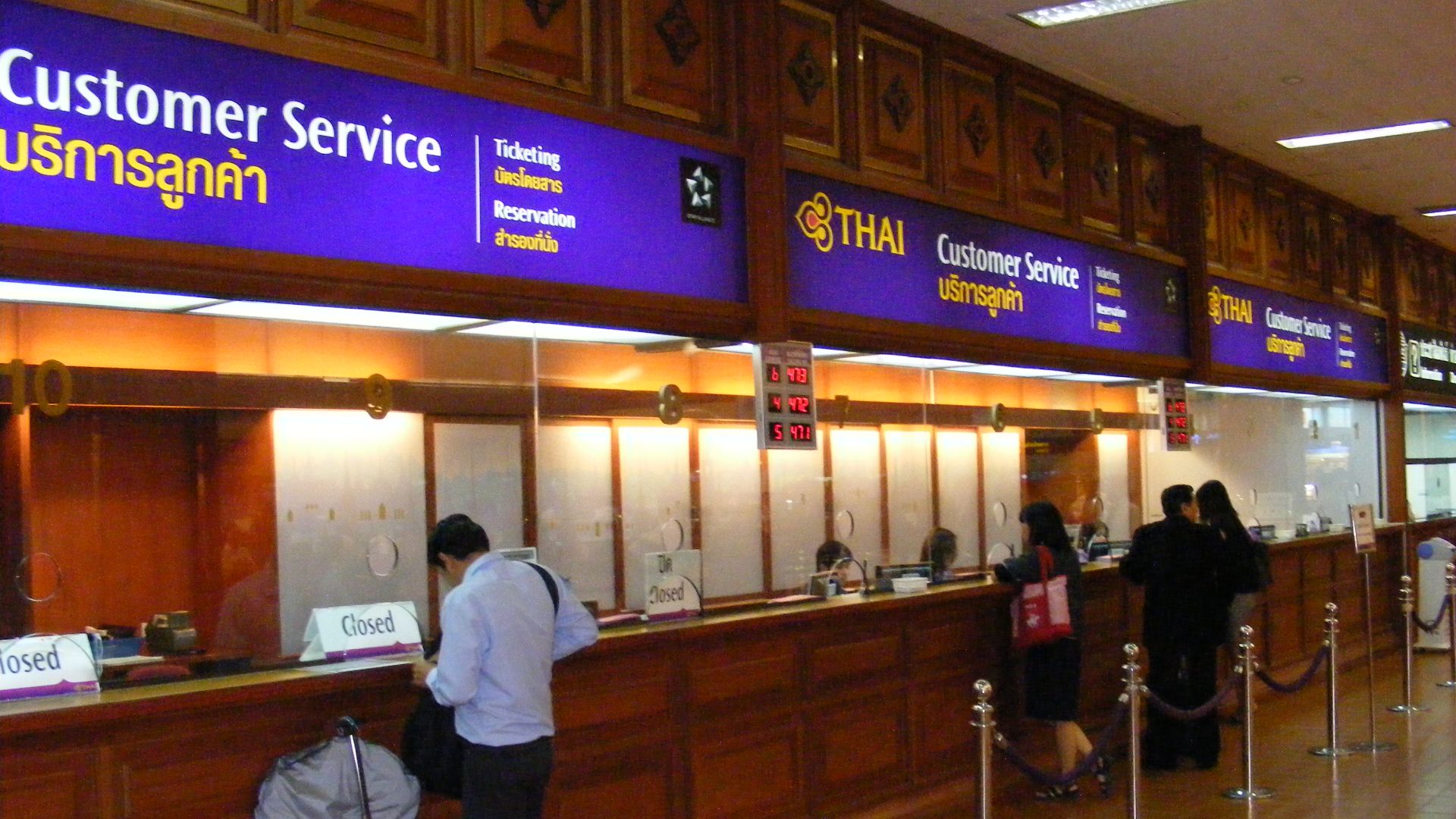 Don Mueang Airport domestic terminal, near Bangkok, Thailand - Thai Airways customer service counters.