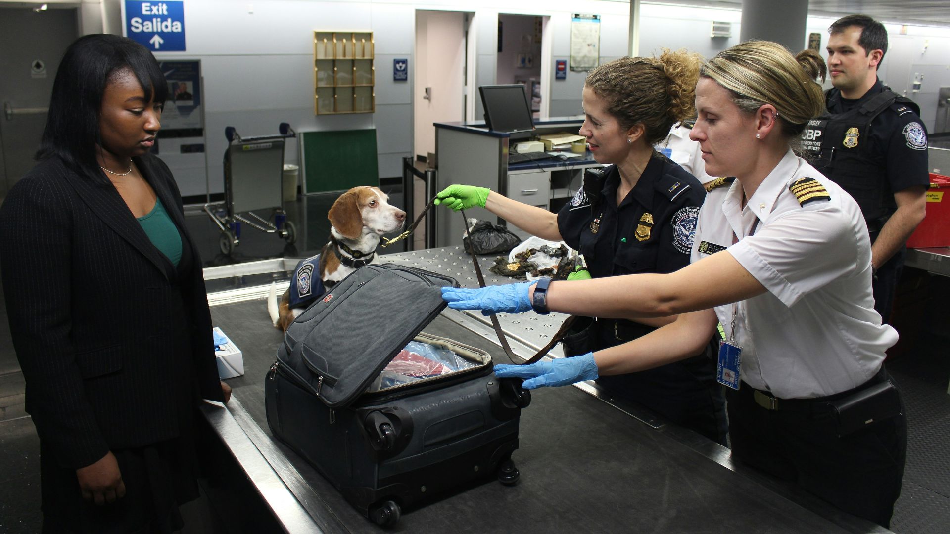 woman in black crew neck t-shirt standing beside woman in white t-shirt
