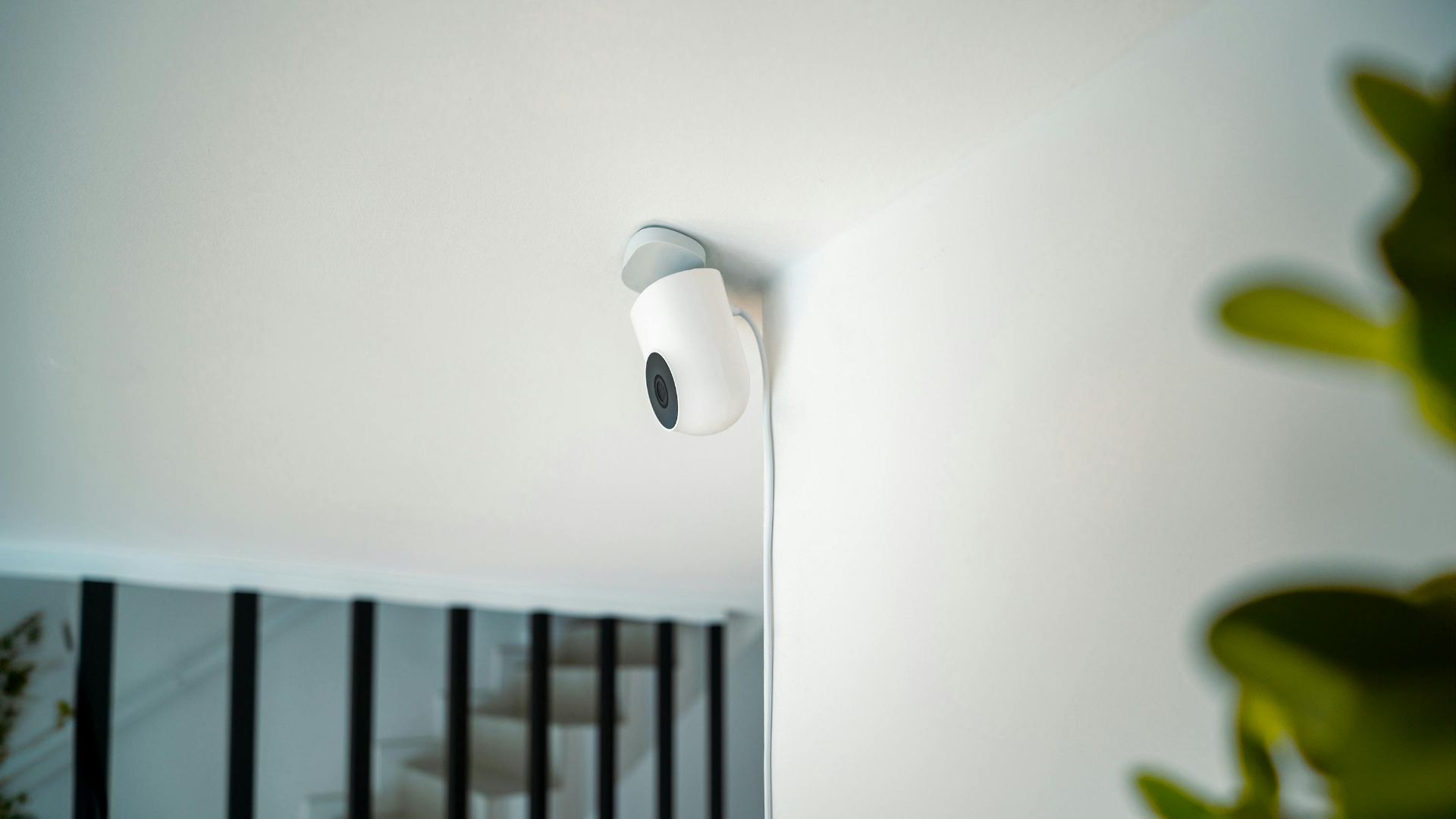 A sleek security camera installed indoors, demonstrating modern surveillance technology.