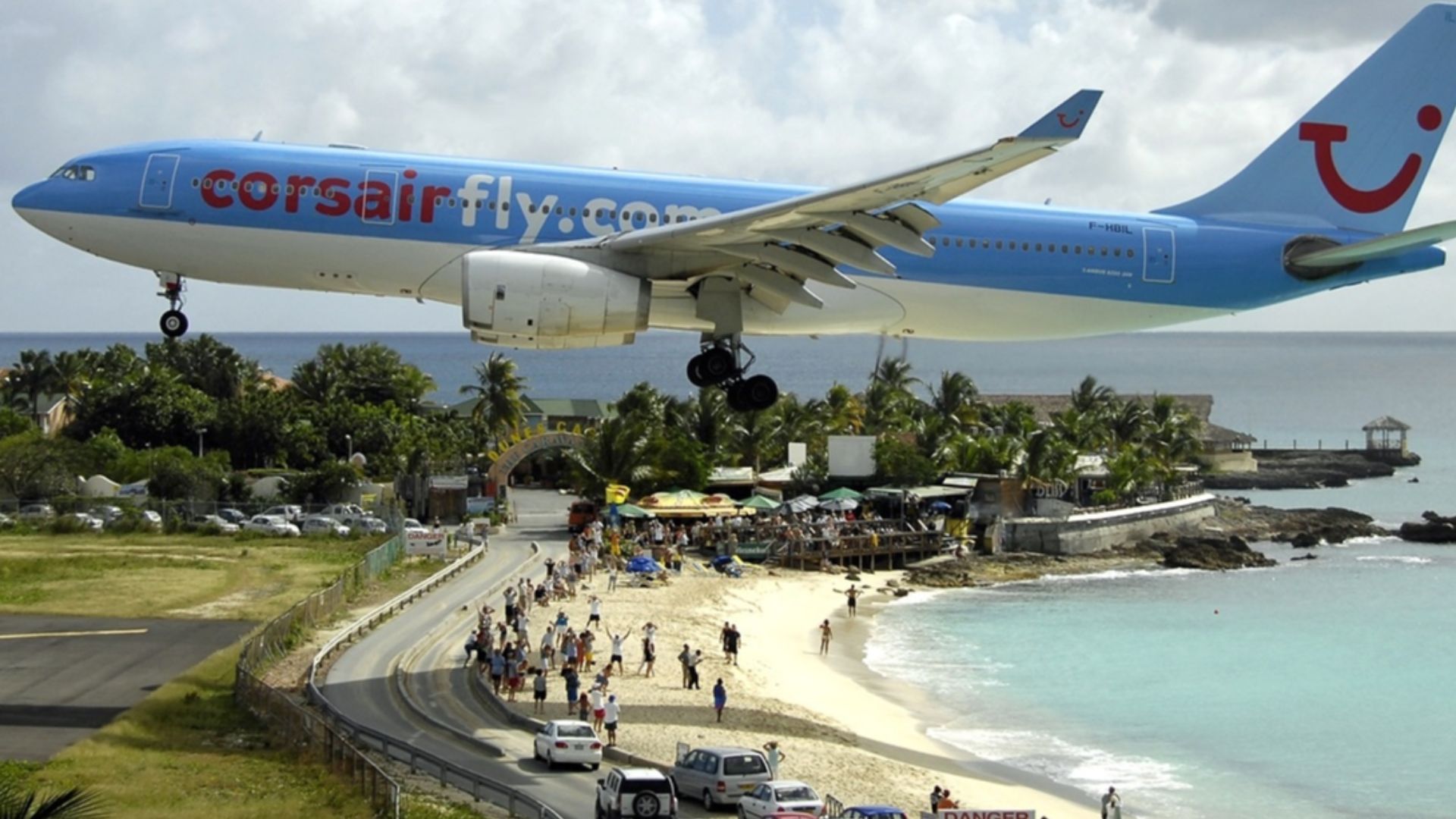 Corsair Airbus A330-200 landing at the world famous Princess Juliana International Airport in Sint Maarten