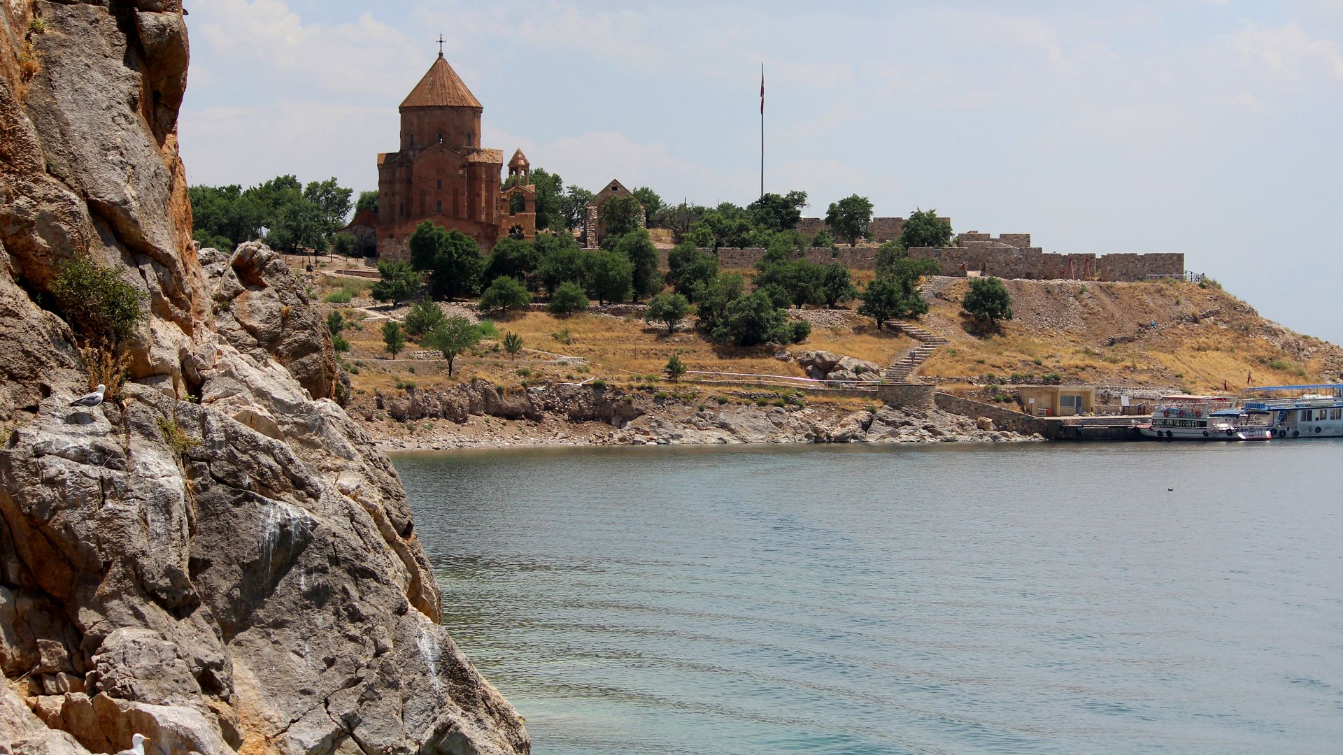 Lake Van and cathedral of the Holy Cross in Akdamar Island, Turkey.