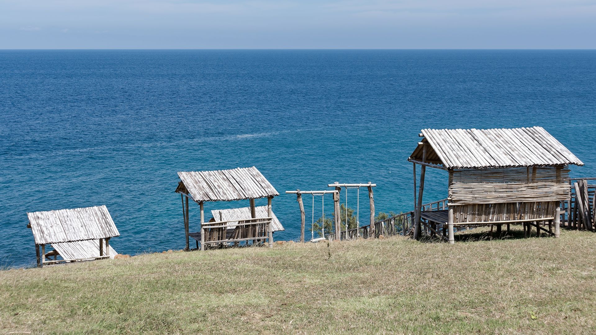 Wooden seaside pavilions on the south coast of Flores Island, Indonesia