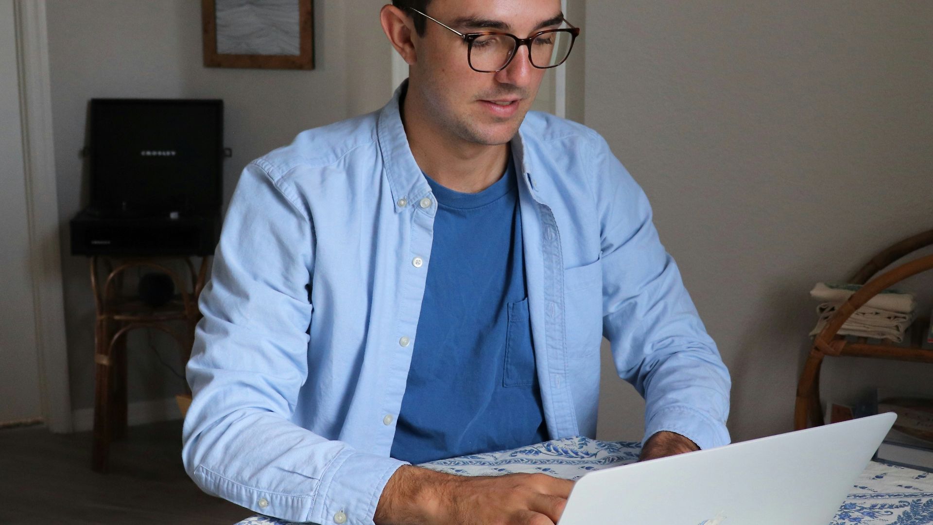 man in white dress shirt wearing black framed eyeglasses