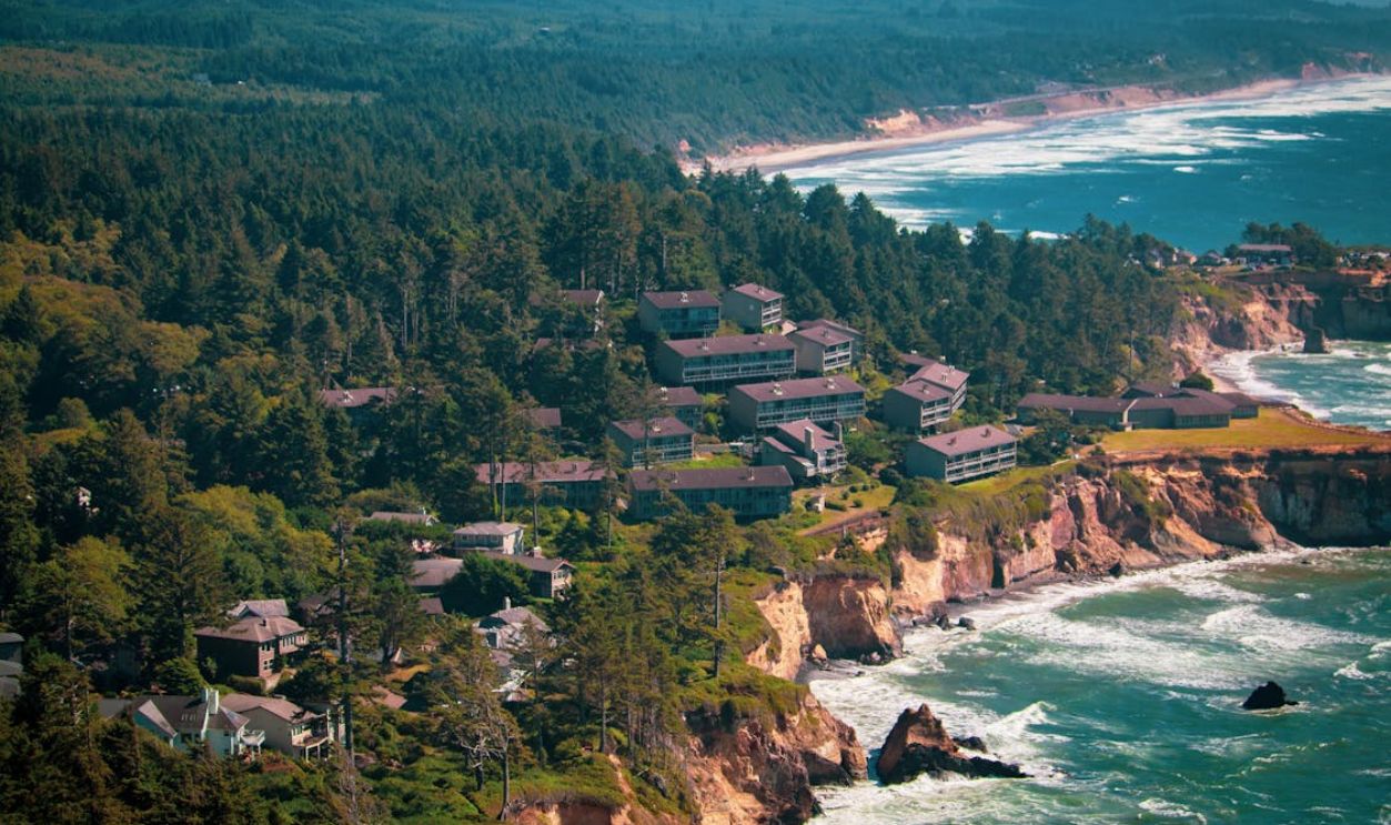 Aerial View of a Village on a Coastal Cliff