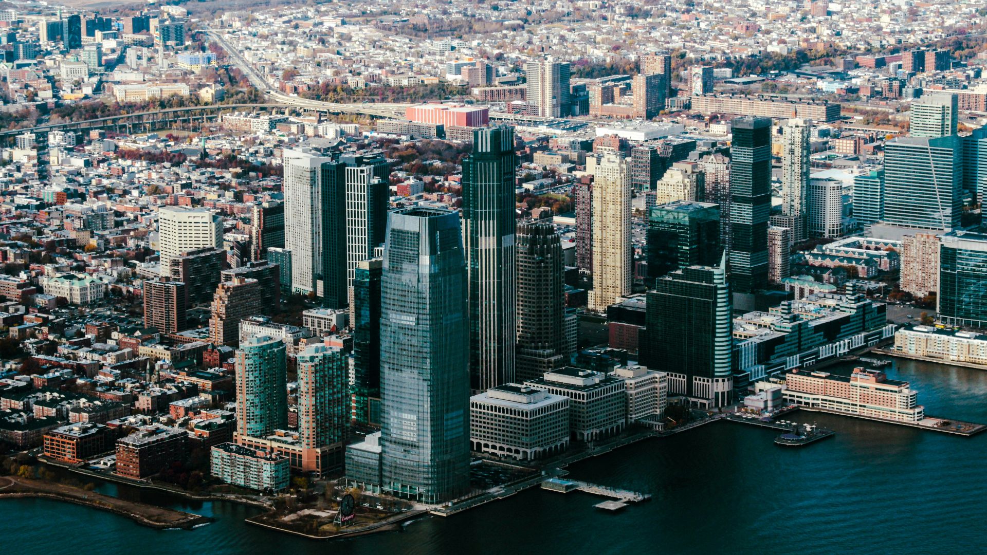 an aerial view of a large city with lots of tall buildings