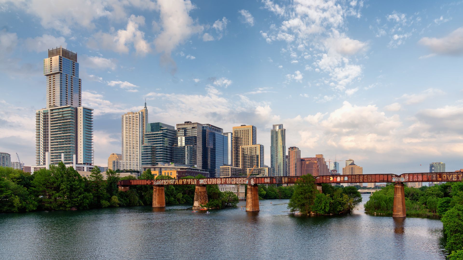 The skyline of Austin, Texas, as seen from a pedestrian bridge over the Colorado River.

© 2019 Tony Webster.