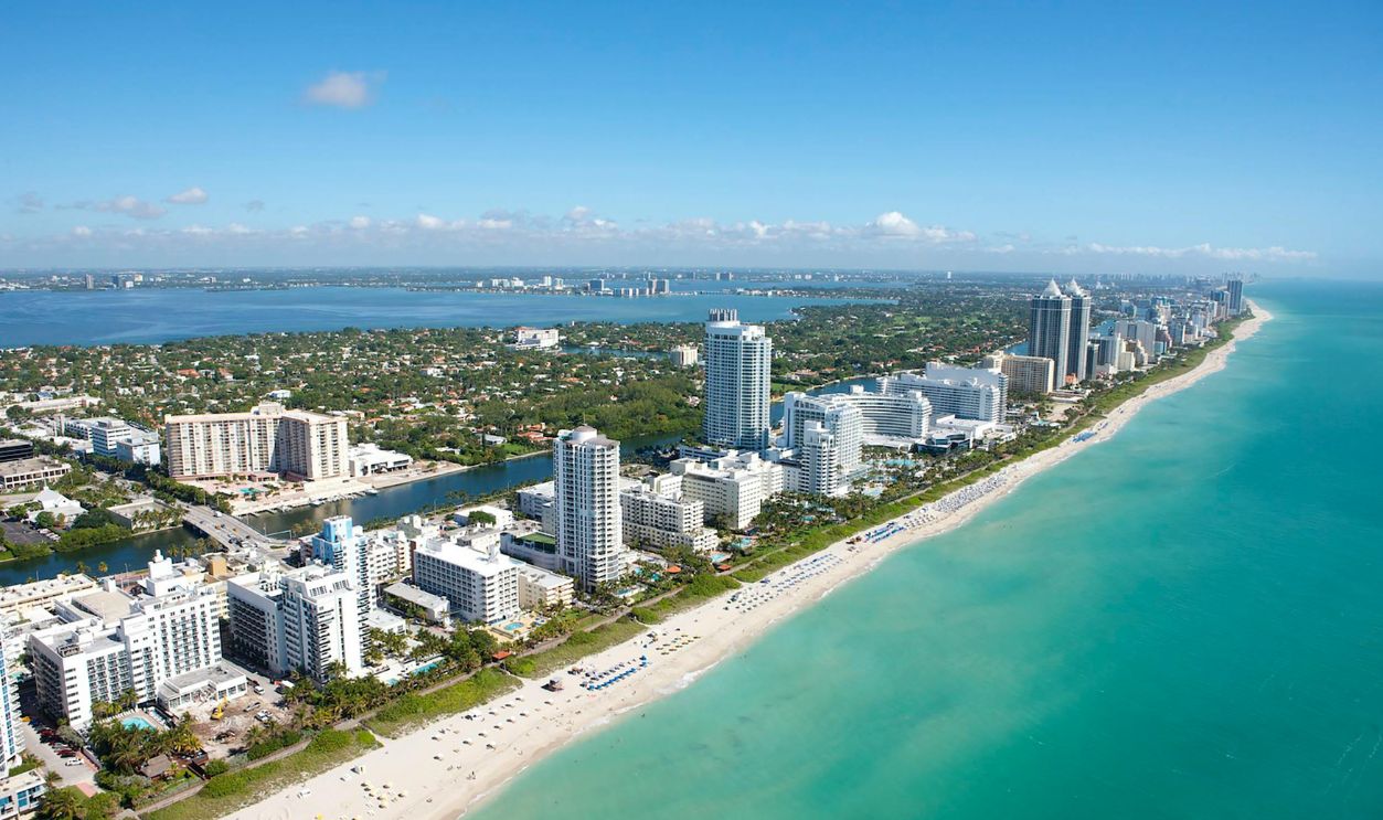 Aerial View of City Buildings Near Body of Water