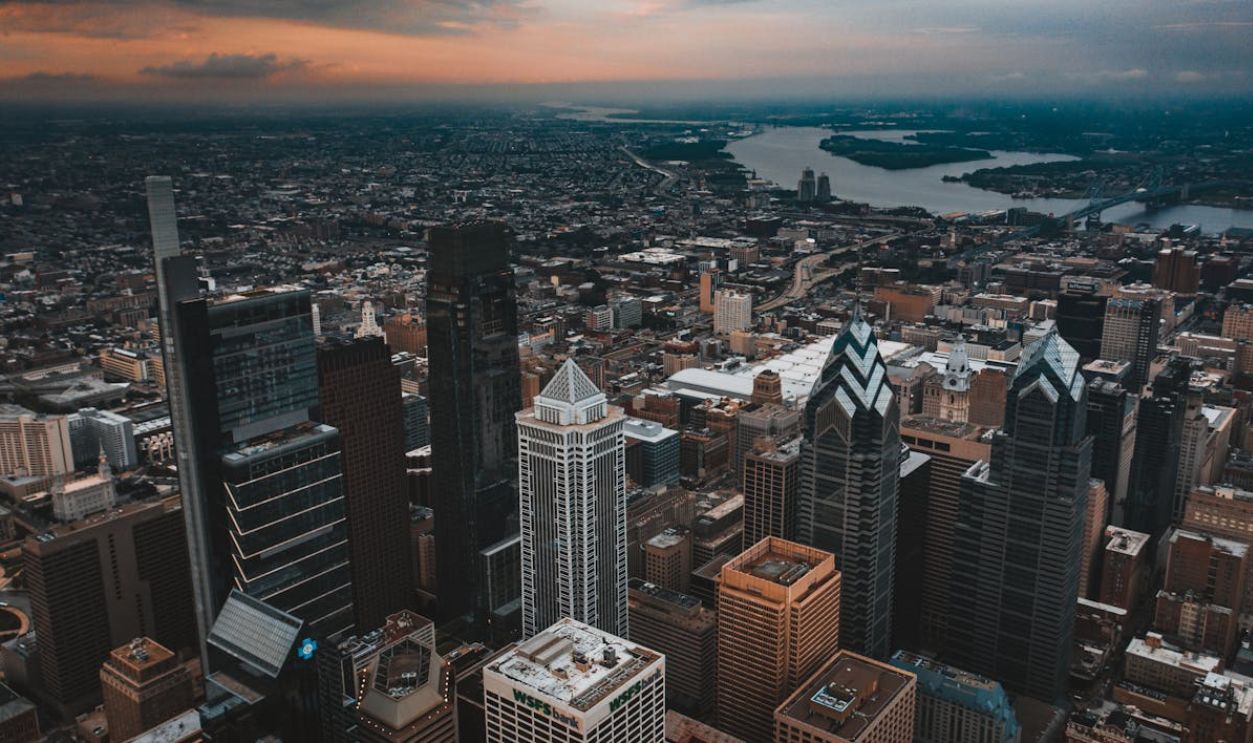 Modern architecture of metropolis with skyscrapers against flowing river