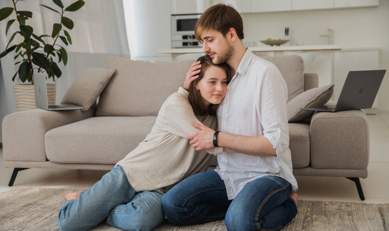 Couple Hugging in Living Room