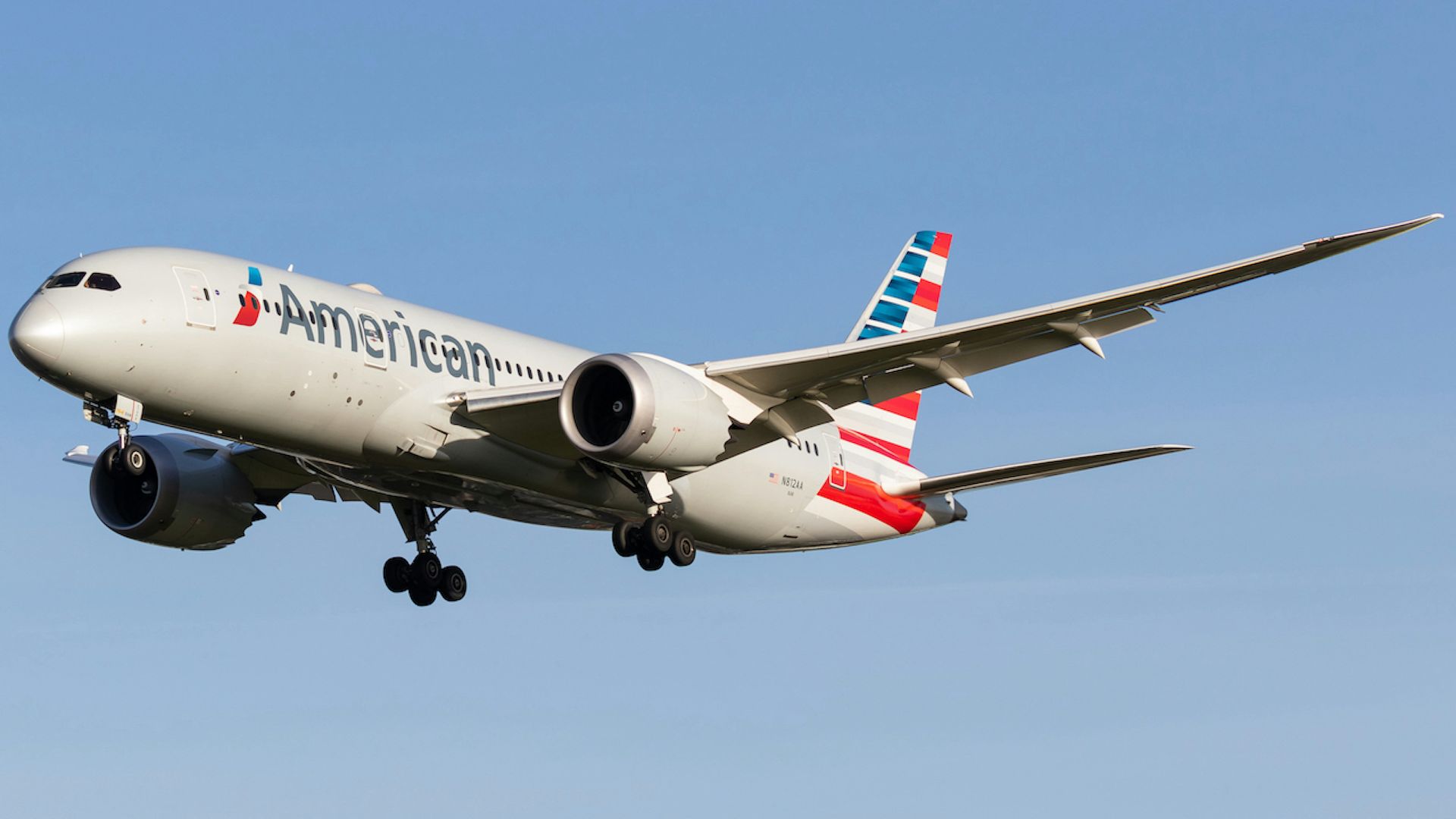 an american airlines plane flying in the sky