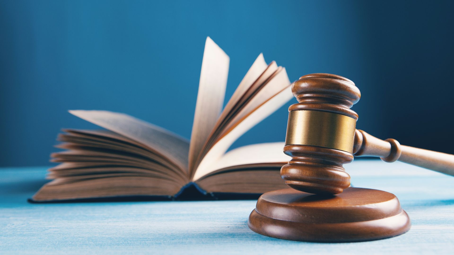 open book on brown wooden table