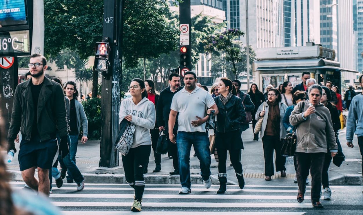 People Walking on Pedestrian Lane during Daytime