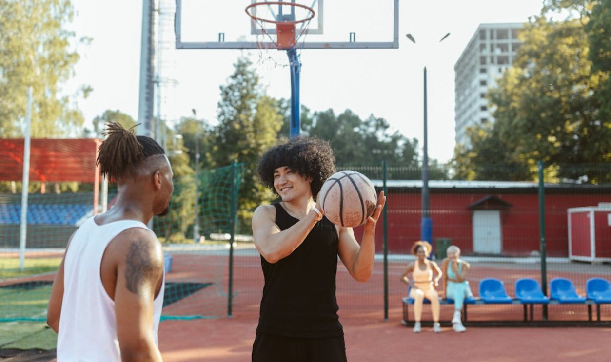 Two Men Playing Basketball