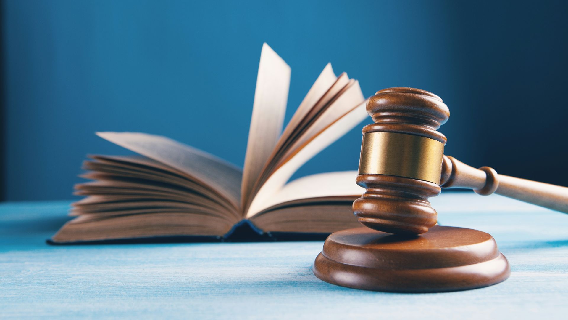 open book on brown wooden table