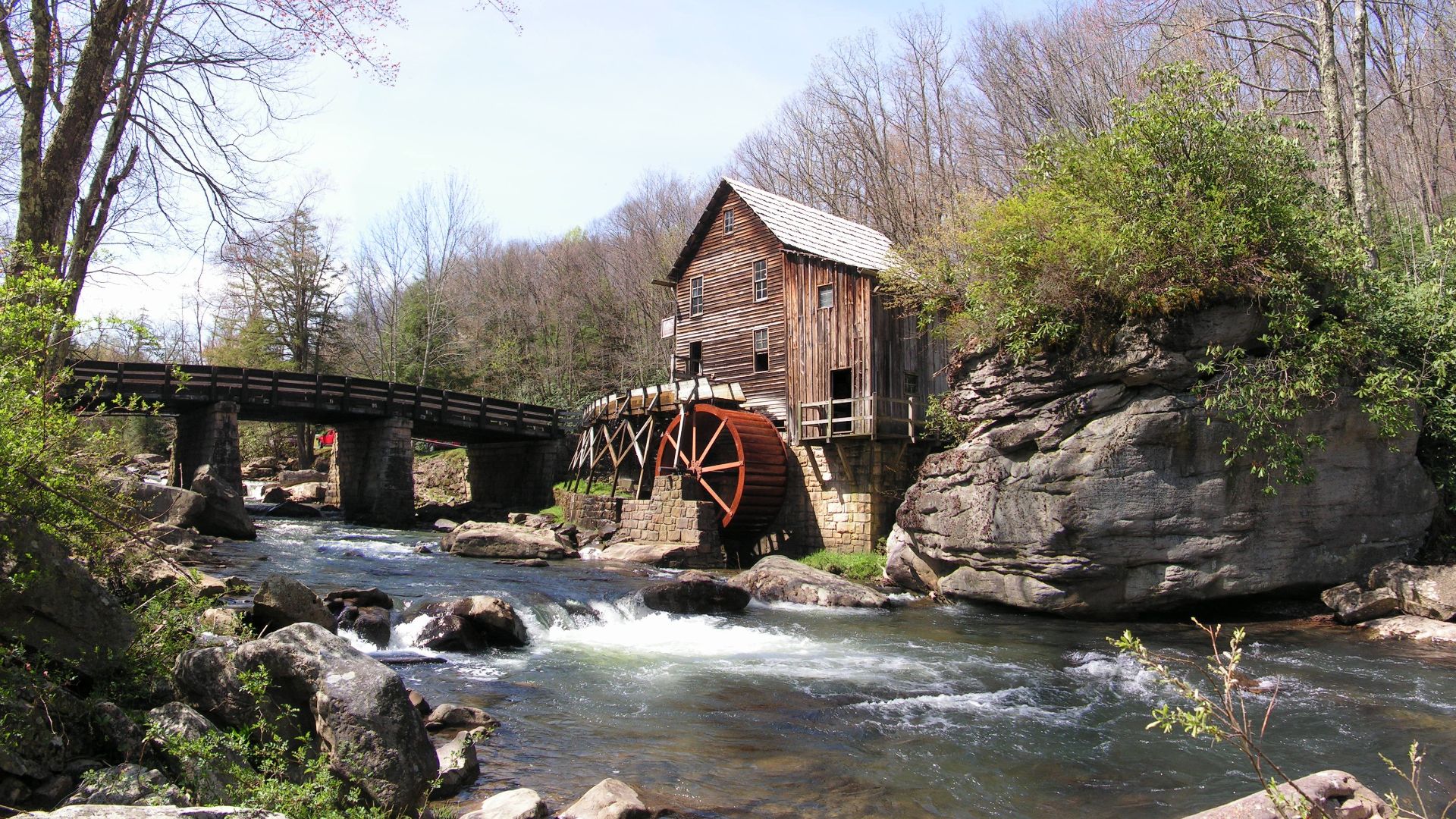 The Glade Creek Grist Mill, an iconic West Virginia attraction in Babcock State Park, WV, USA.
This semi-panorama was assembled from six separate parts, each taken with the same aperture and shutter settings for maximum compatibility. I used Paint Shop Pro 8, my graphic tablet, and my favorite method of erasing the layers into each other for assembly. The EXIF tag is a mockup from the bottom central picture, but most of the info should be correct, except for the image size.