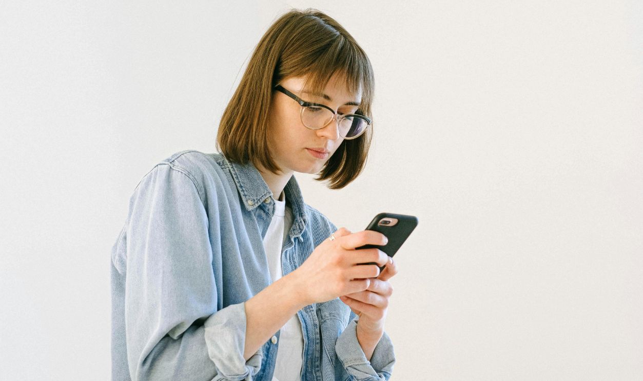 Woman Checking Smartphone