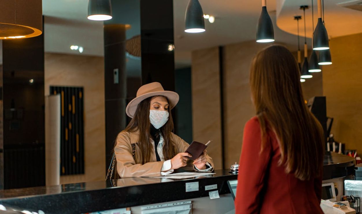 A Woman Standing at the Counter