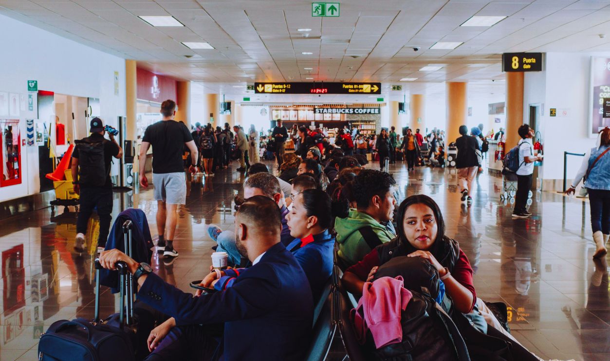 People Waiting in Departure Gate Waiting Area