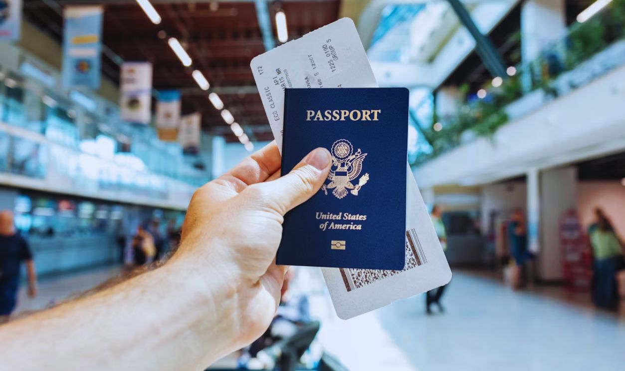 a hand holding a book
