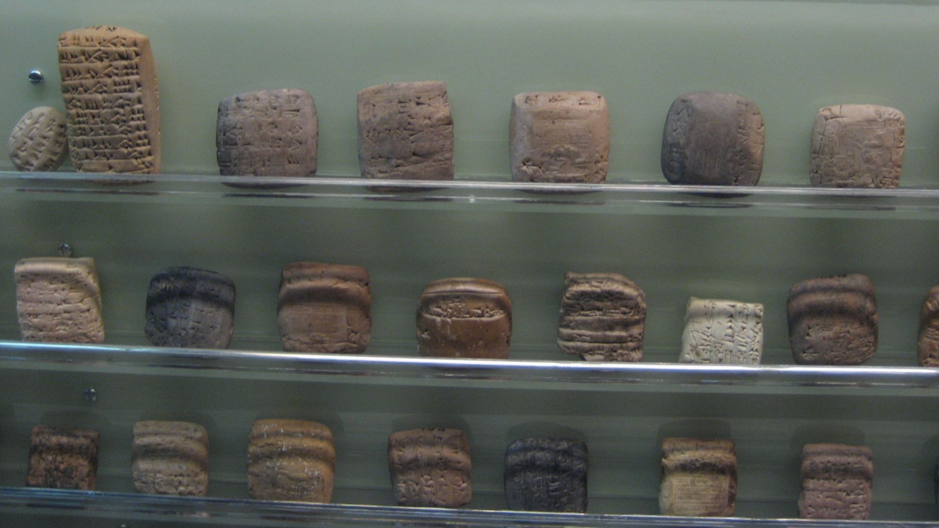 Cuneiform tablets preserved  in a museum.