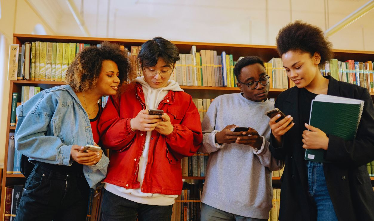 A Group of People Using Smartphones