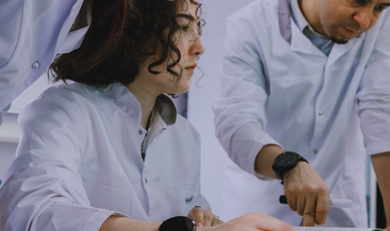 Group of Scientists Working Together