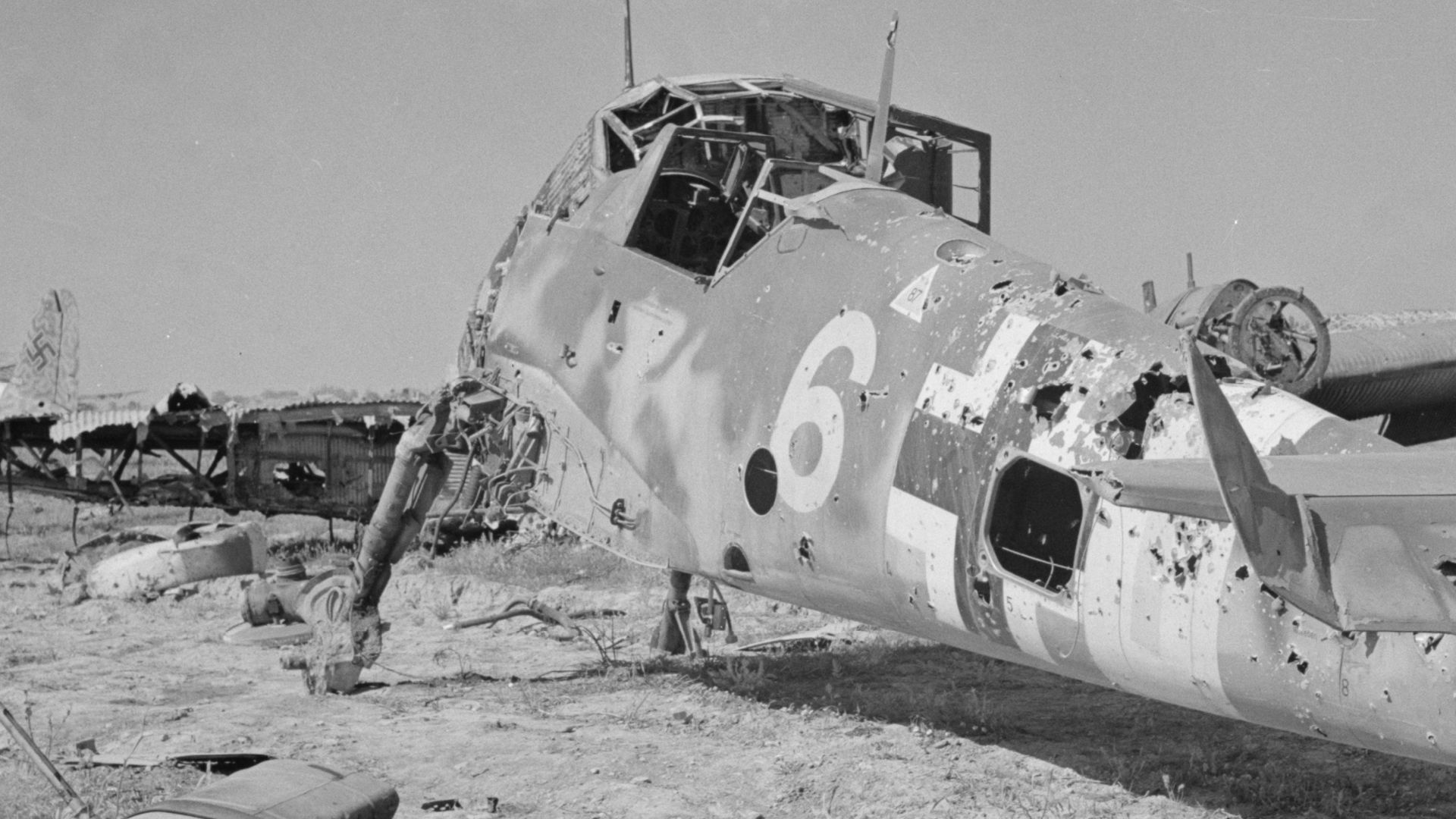 Wreck of German Messerschmitt Bf 109 F/G fighter at El Aouiana airport, Tunis, Tunisia, May 1943. It wears the marking
