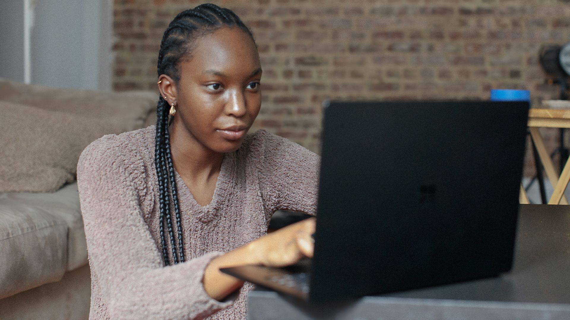 person using black Surface device