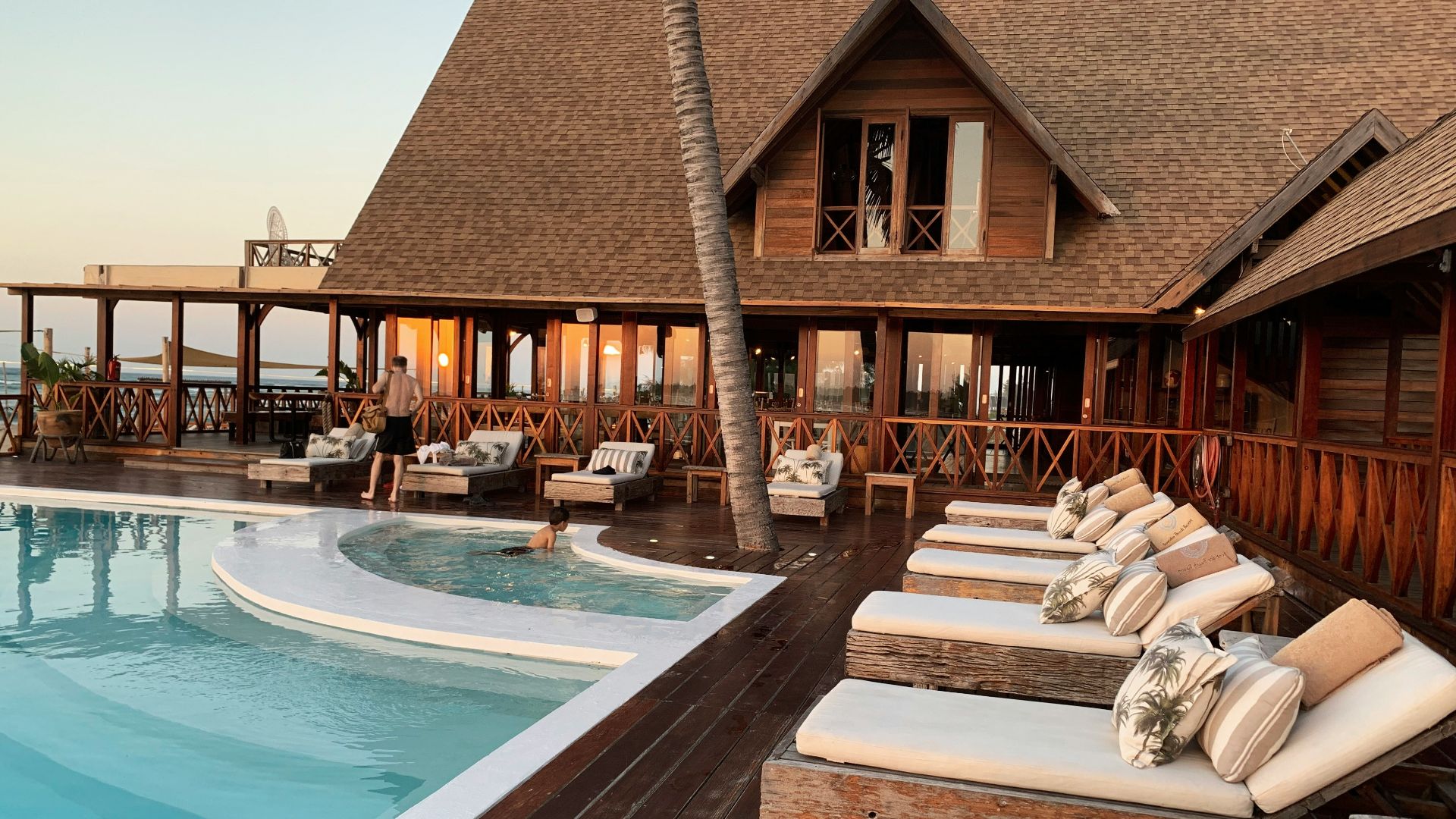 person in swimming pool during daytime