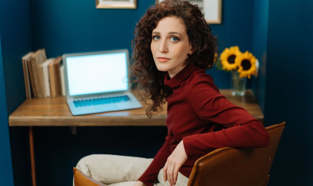 Woman Sitting on Chair