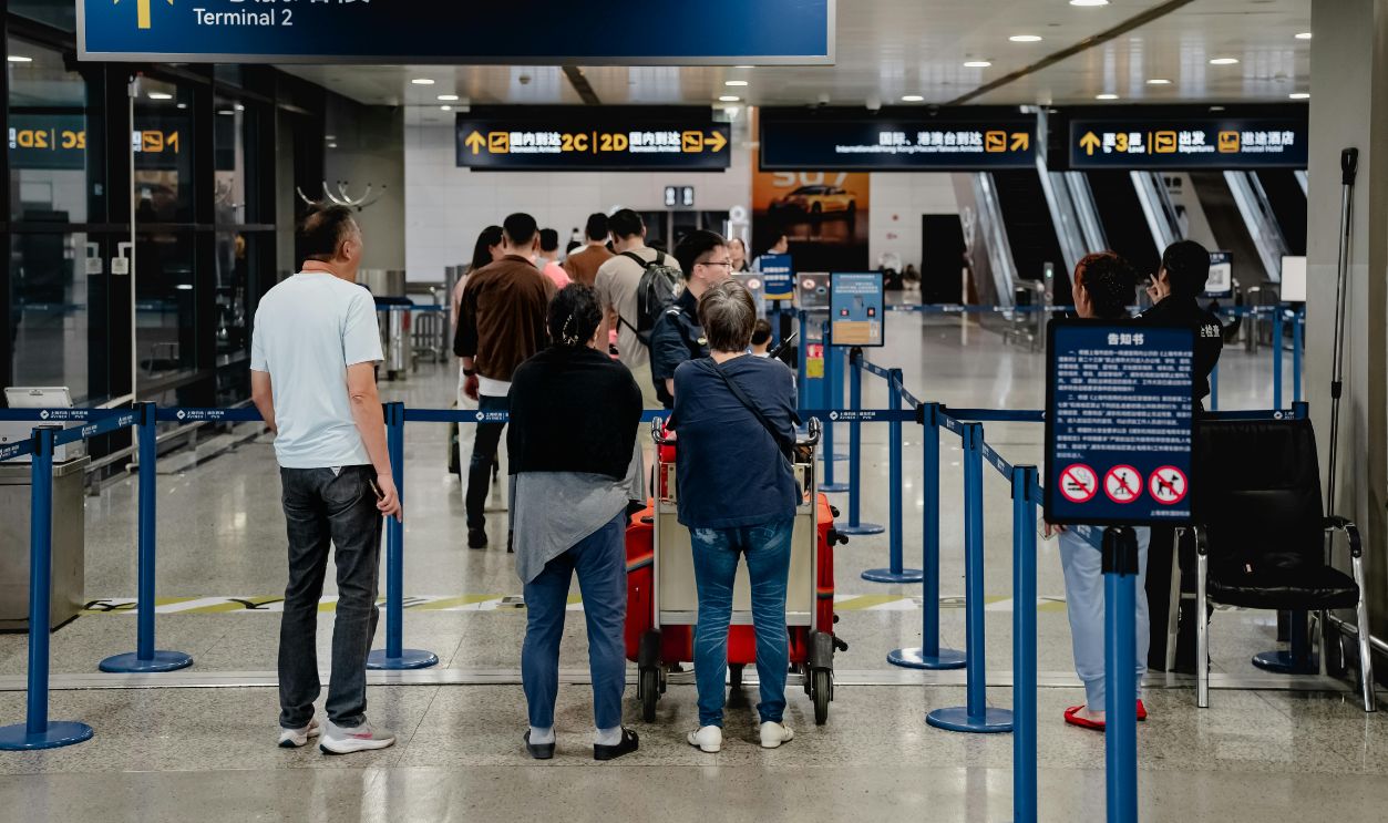 Travelers at Terminal 2 in Shanghai Airport