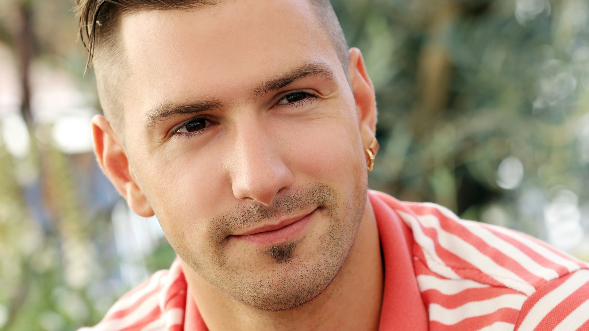 a man in a red and white striped shirt