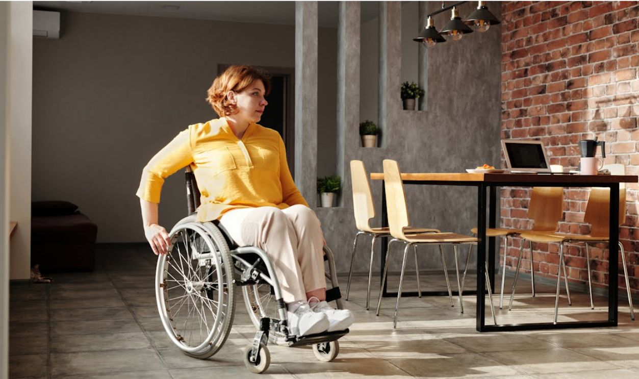 Woman Sitting in Wheelchair