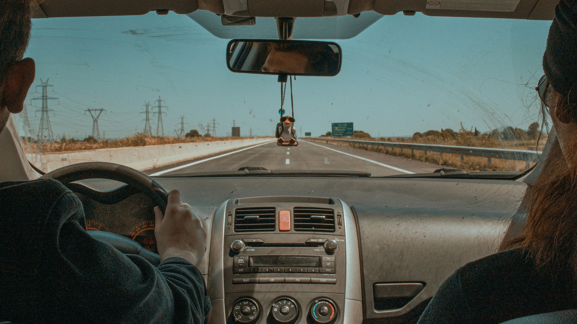 a couple of people that are in a car
